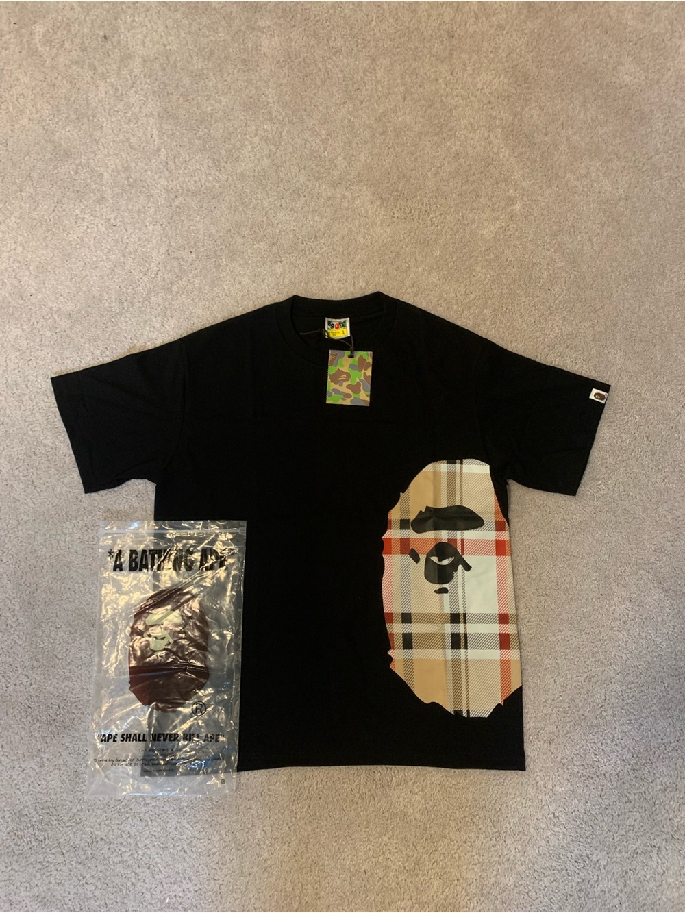 A Bathing Ape Short Sleeve Tee - Black with Plaid Ape Graphic